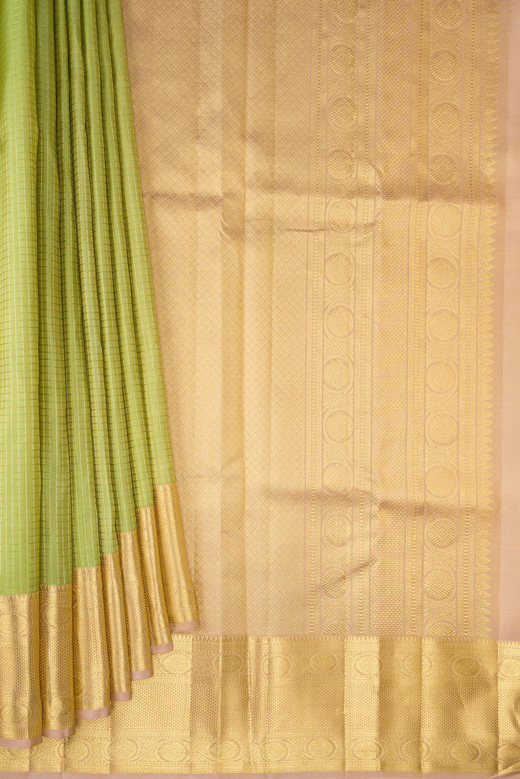 Pleats and pallu of Pure Silk Pista Green Kanchipuram Saree with Checked design on the body and Zari Border. 