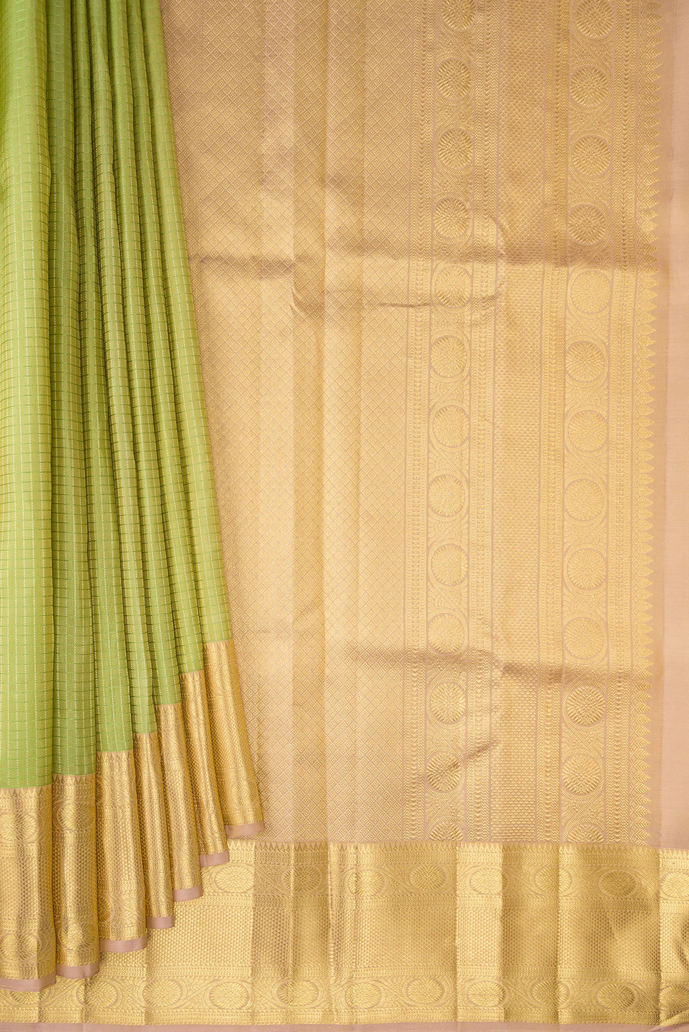 Pleats and pallu of Pure Silk Pista Green Kanchipuram Saree with Checked design on the body and Zari Border. 