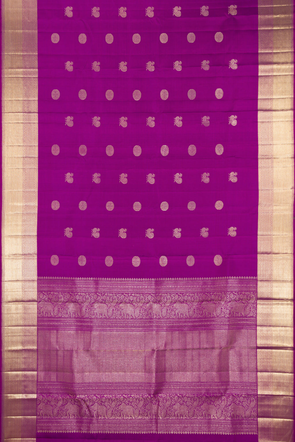 Flat view of Pure Silk Purple Kanjivaram Saree with Zari Butta on the body and Zari Border. 