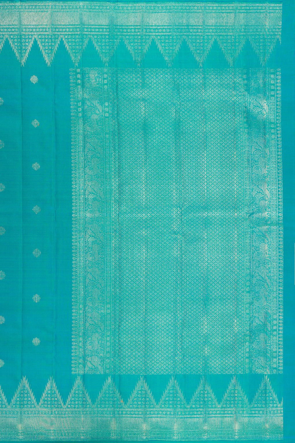 Close up image of the pallu of Pure Silk Peacock Blue Kanchipuram Saree with Zari Butta on the body and Temple Border. 