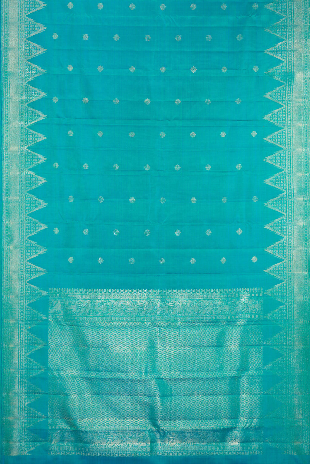 Flat view of Pure Silk Peacock Blue Kanchipuram Saree with Zari Butta on the body and Temple Border. 