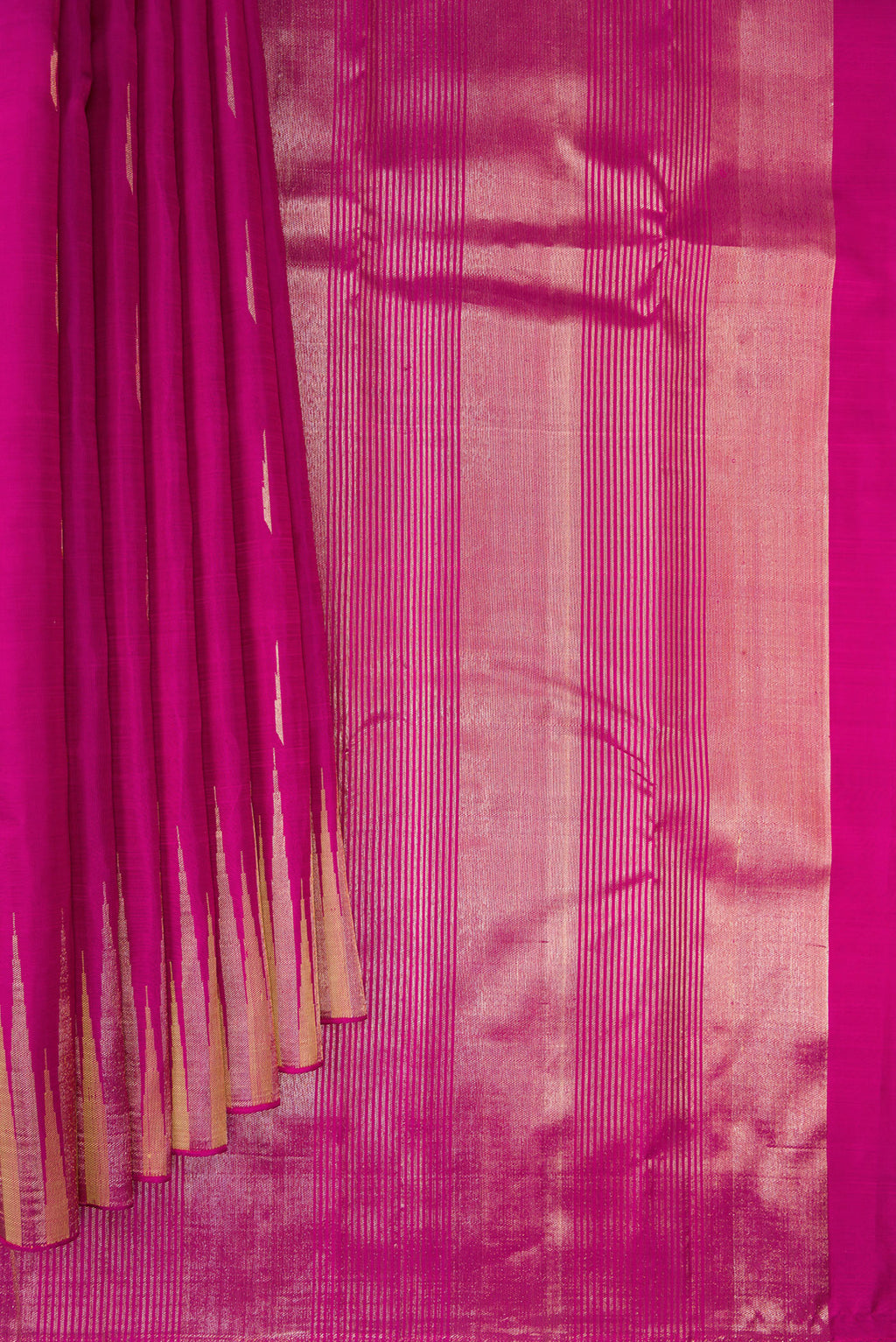 Pleats and pallu of Pure Silk Magenta Kanjivaram Saree with Zari Butta on the body and Fancy Border. 