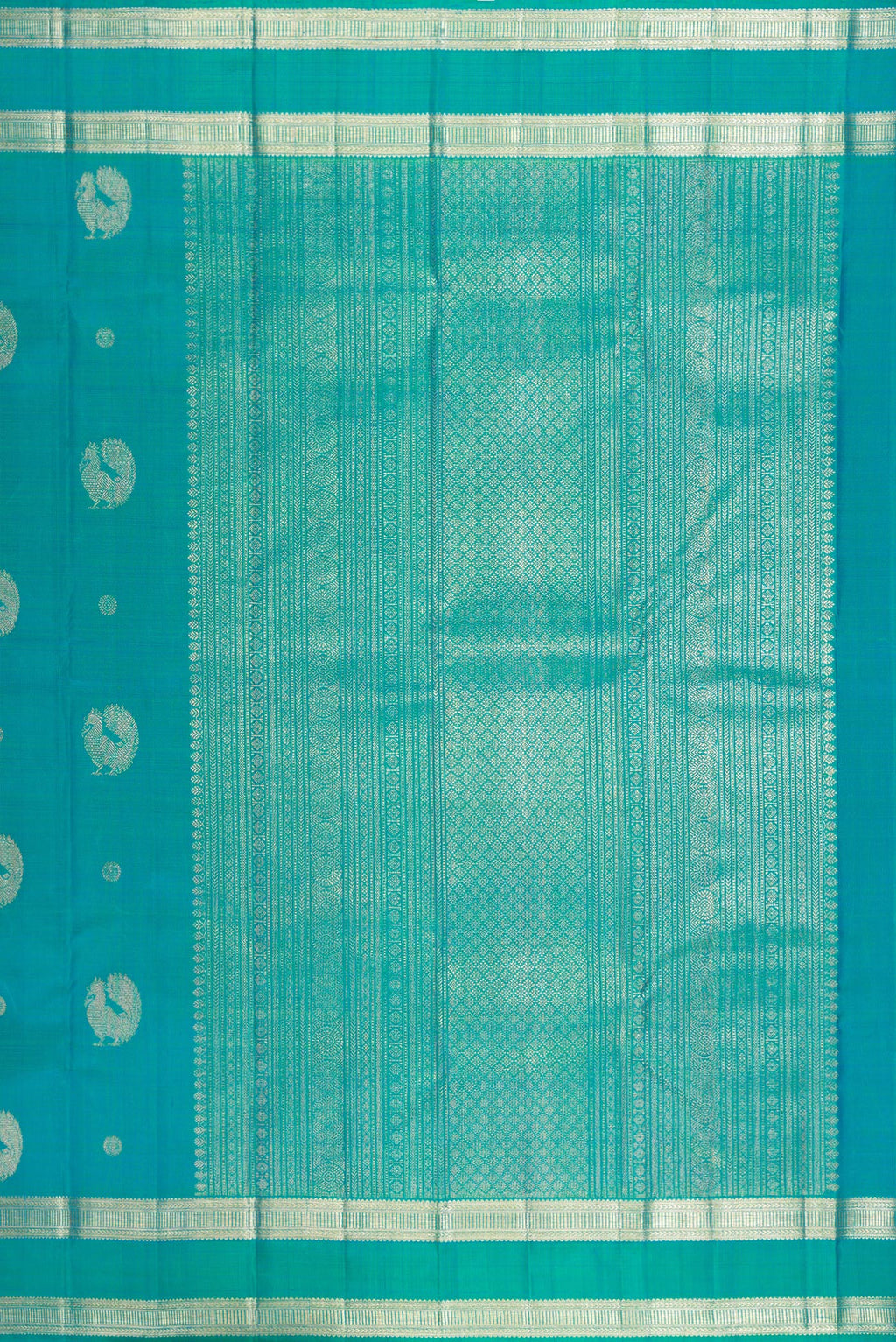 Close up image of the pallu of Pure Silk Blue Kanjivaram Saree with Zari Butta on the body and Zari Border. 