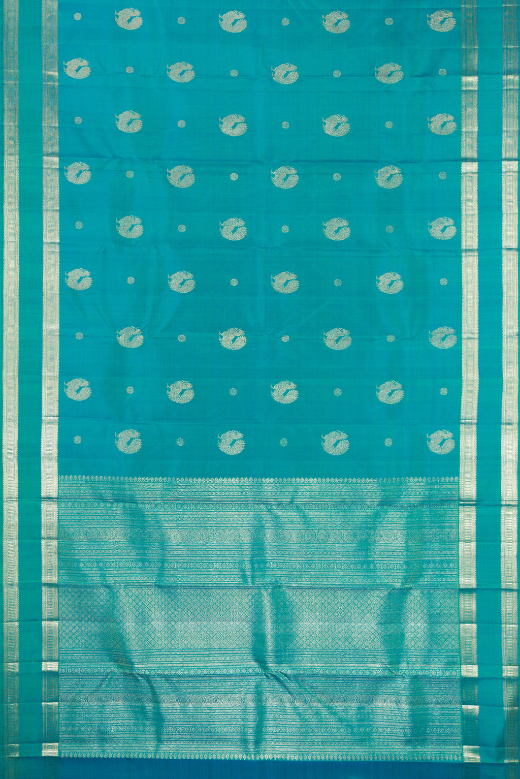 Flat view of Pure Silk Blue Kanjivaram Saree with Zari Butta on the body and Zari Border. 