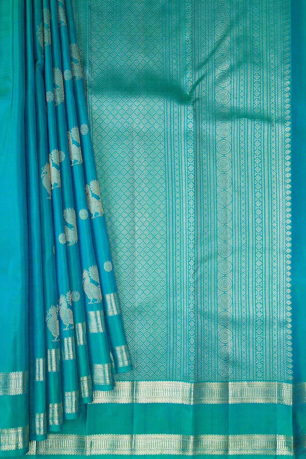 Pleats and pallu of Pure Silk Blue Kanjivaram Saree with Zari Butta on the body and Zari Border. 