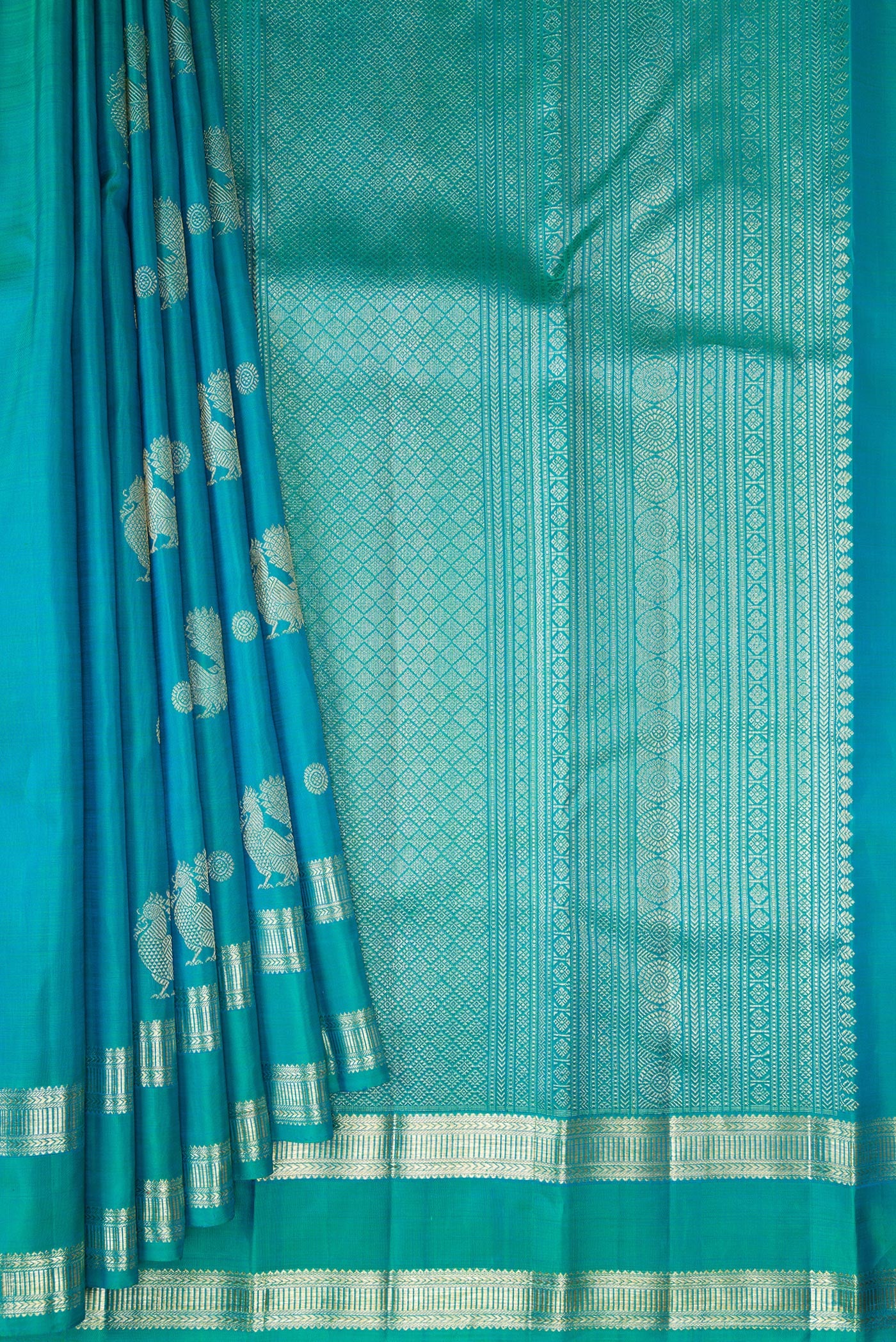 Pleats and pallu of Pure Silk Blue Kanjivaram Saree with Zari Butta on the body and Zari Border. 