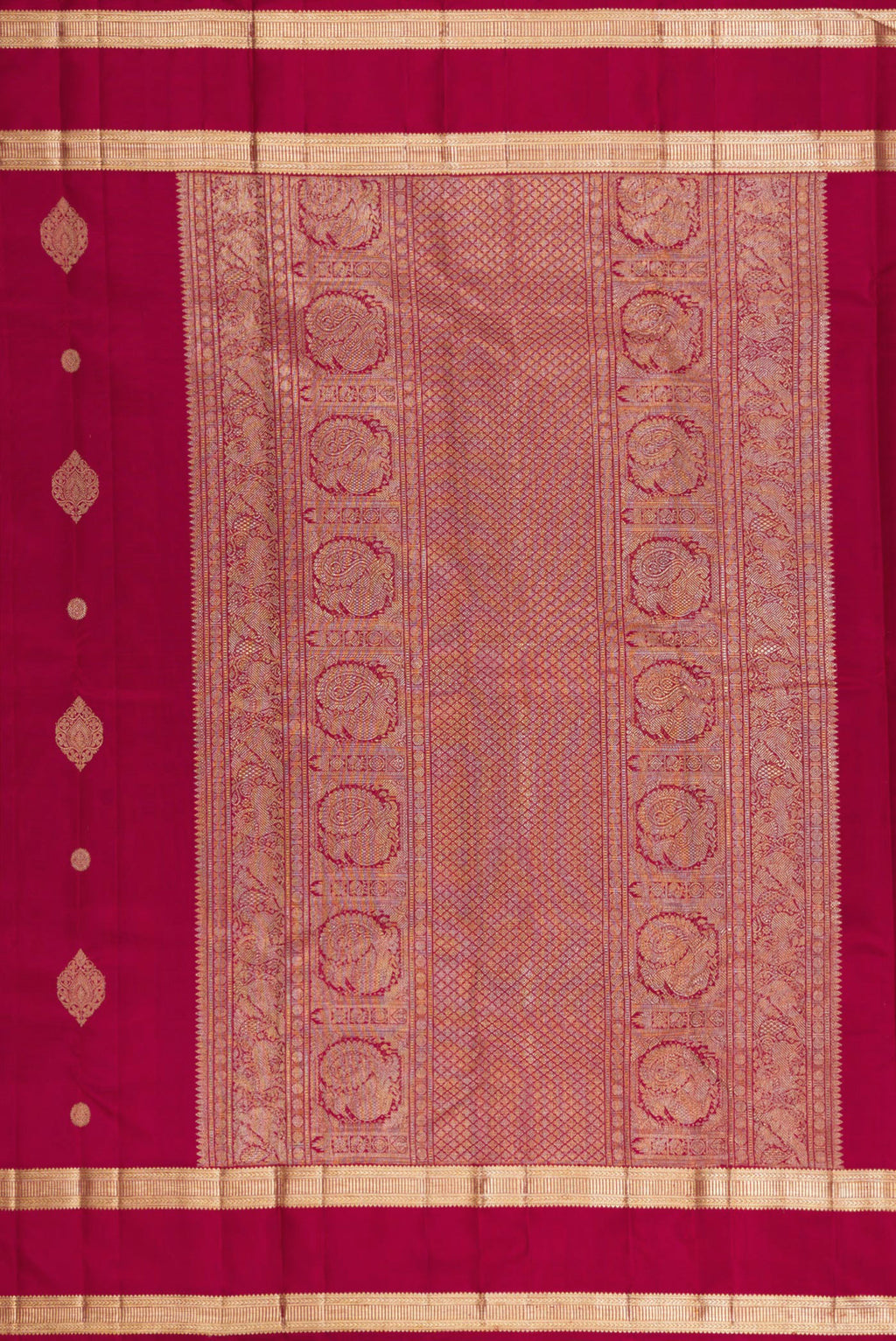 Close up image of the pallu of Pure Silk Maroon Kanjivaram Saree with Zari Butta on the body and Zari Border. 