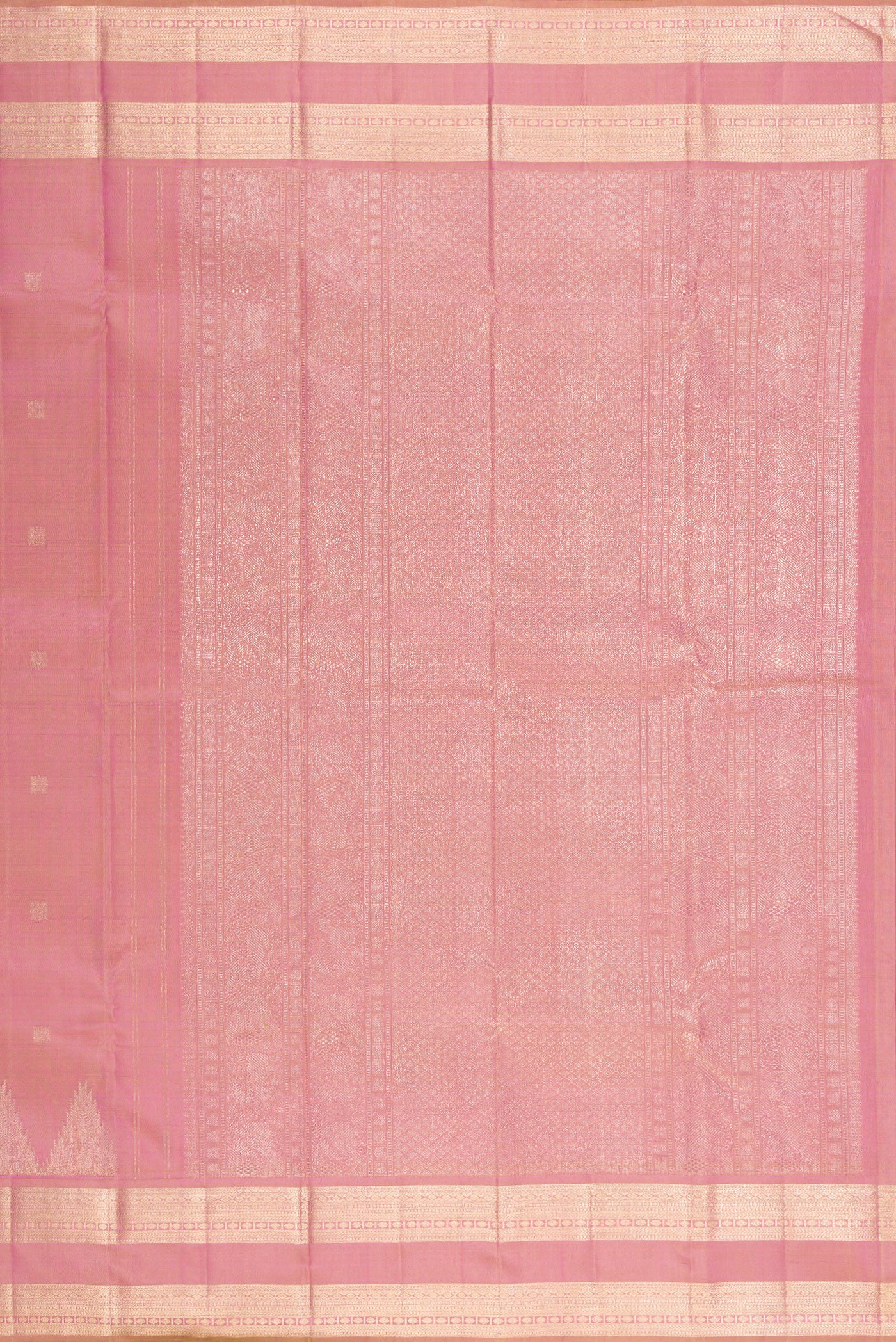 Close up image of the pallu of Pure Silk Rose Gold Dual Tone Kanjivaram Saree with Zari Butta on the body and Zari Border. 