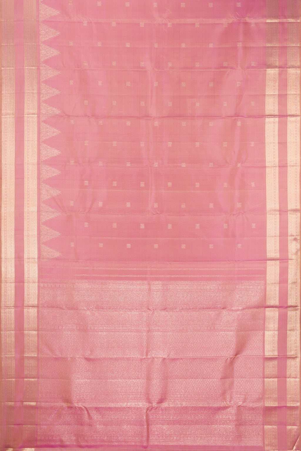 Flat view of Pure Silk Rose Gold Dual Tone Kanjivaram Saree with Zari Butta on the body and Zari Border. 