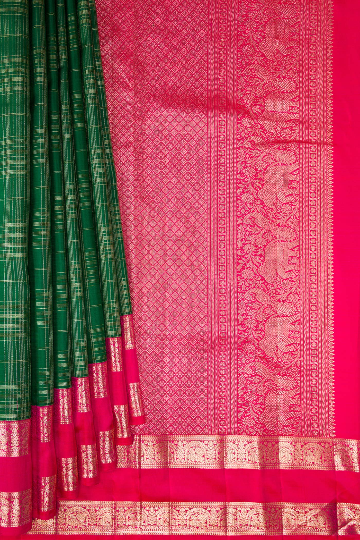 Pleats and pallu of Pure Silk Green Kanchipuram Saree with Checked design on the body and Zari Border. 