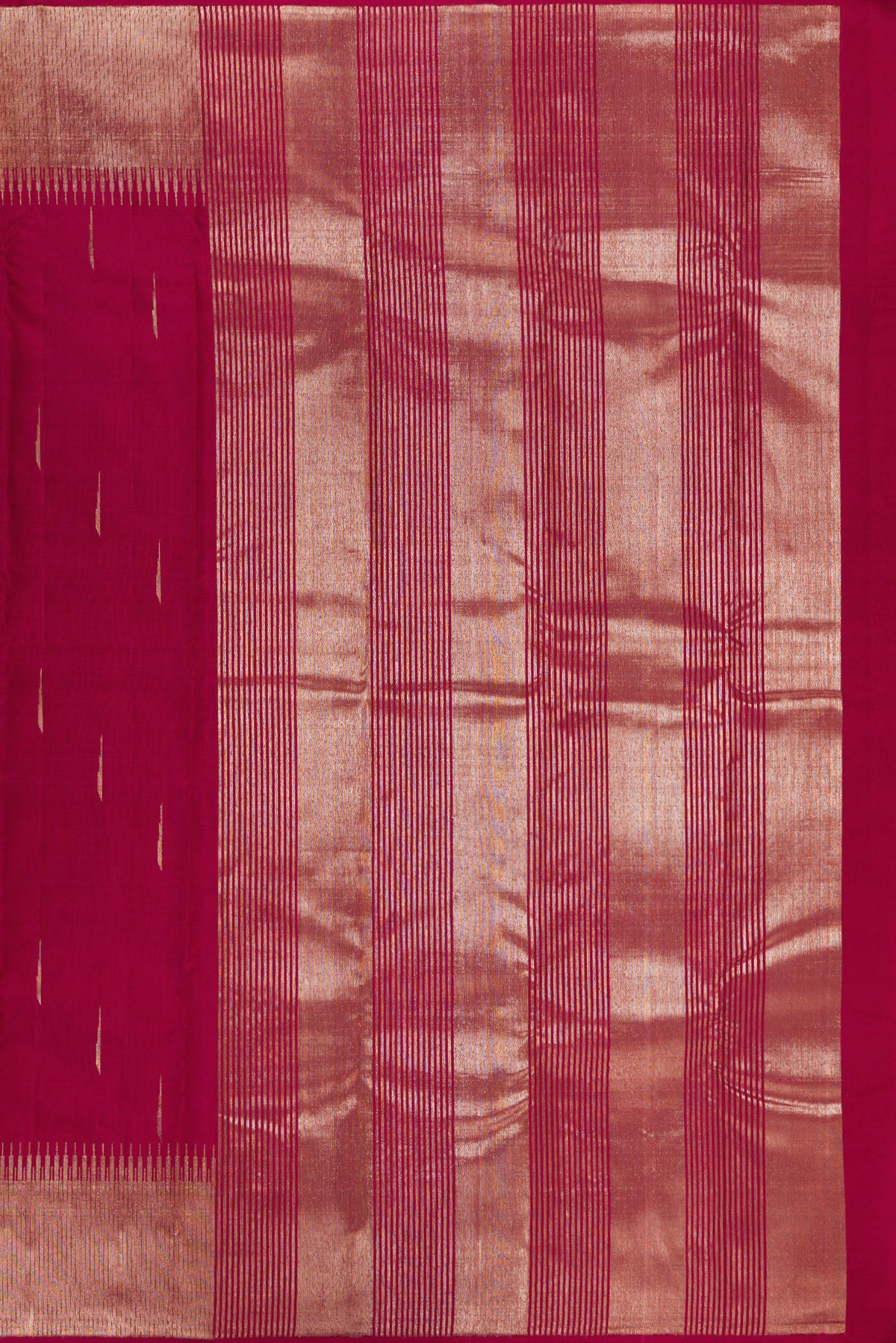 Close up image of the pallu of Pure Silk Maroon Kanjivaram Saree with Zari Butta on the body and Fancy Border. 