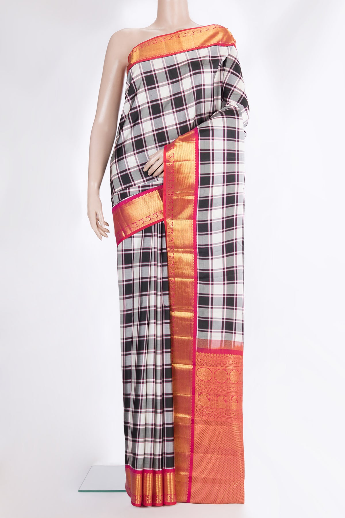 Pure Silk Multi Color Kanchipuram Saree with Checked design on the body and Zari Border.  displayed on a mannequin