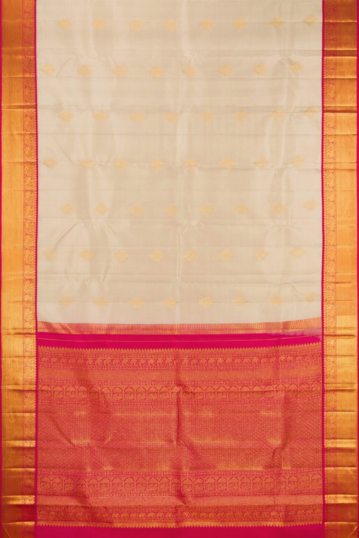 Flat view of Pure Silk Beige Kanjivaram Saree with Zari Butta on the body and Zari Border. 