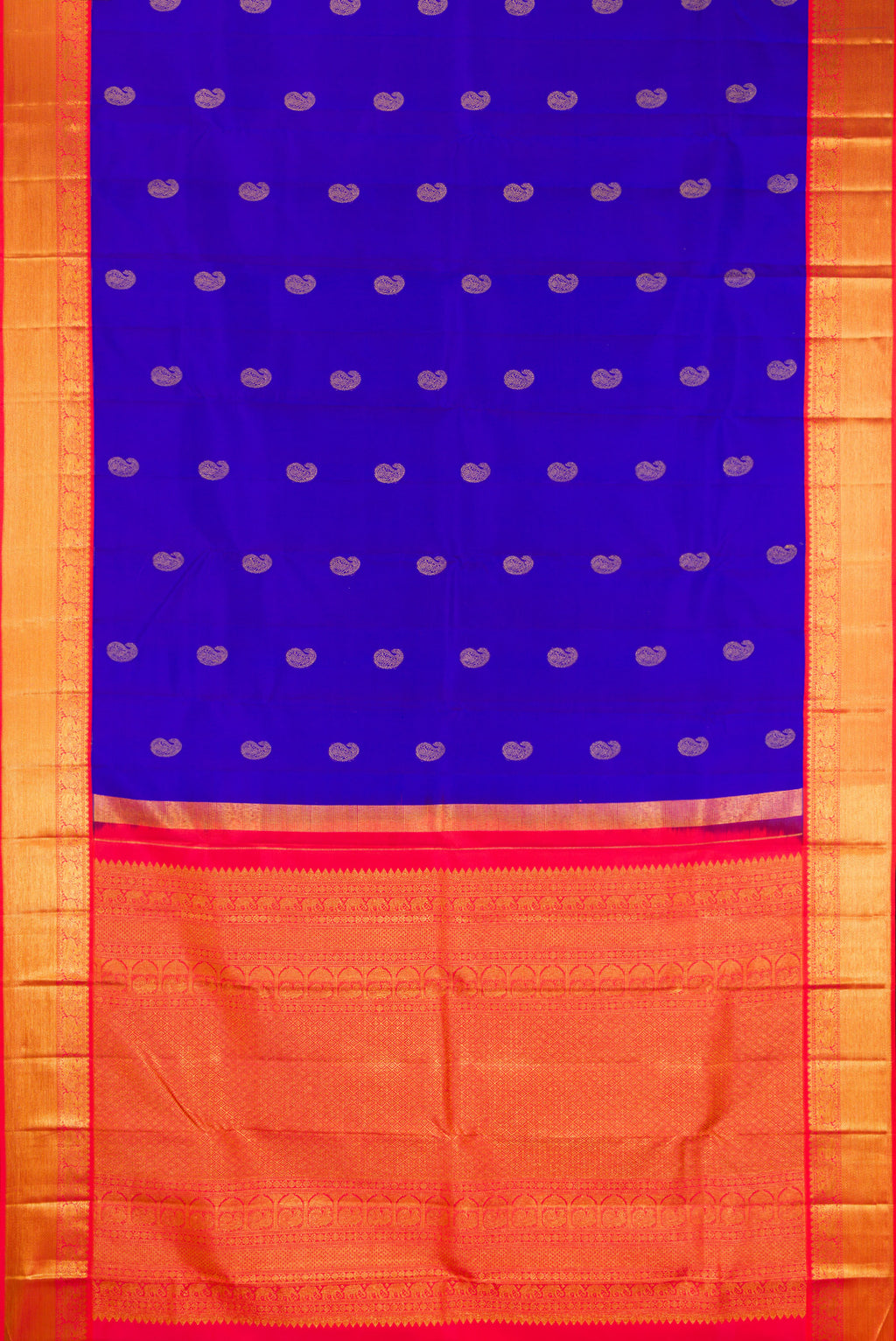 Flat view of Pure Silk Royal Blue Kanjivaram Saree with Zari Butta on the body and Zari Border. 
