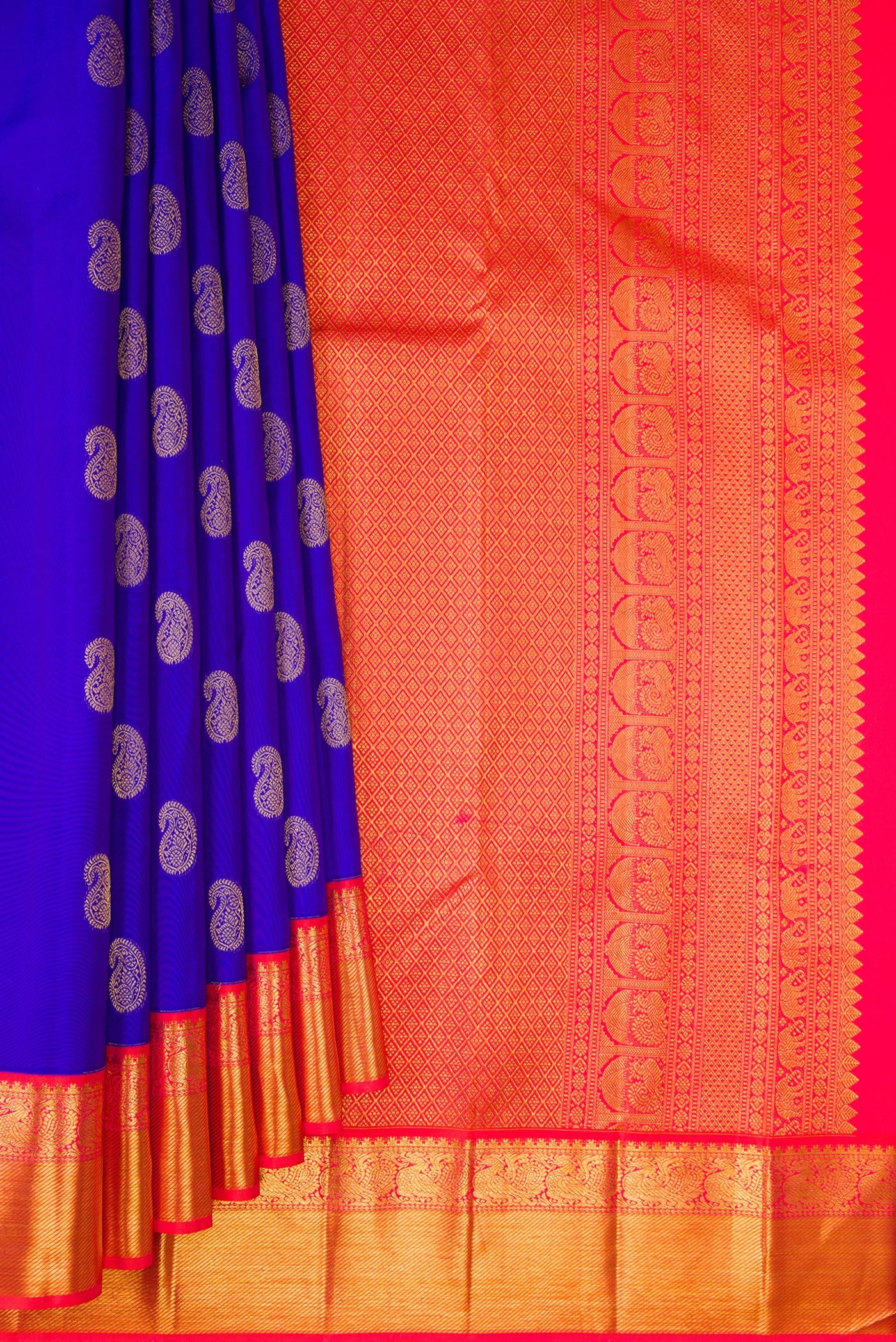 Pleats and pallu of Pure Silk Royal Blue Kanjivaram Saree with Zari Butta on the body and Zari Border. 