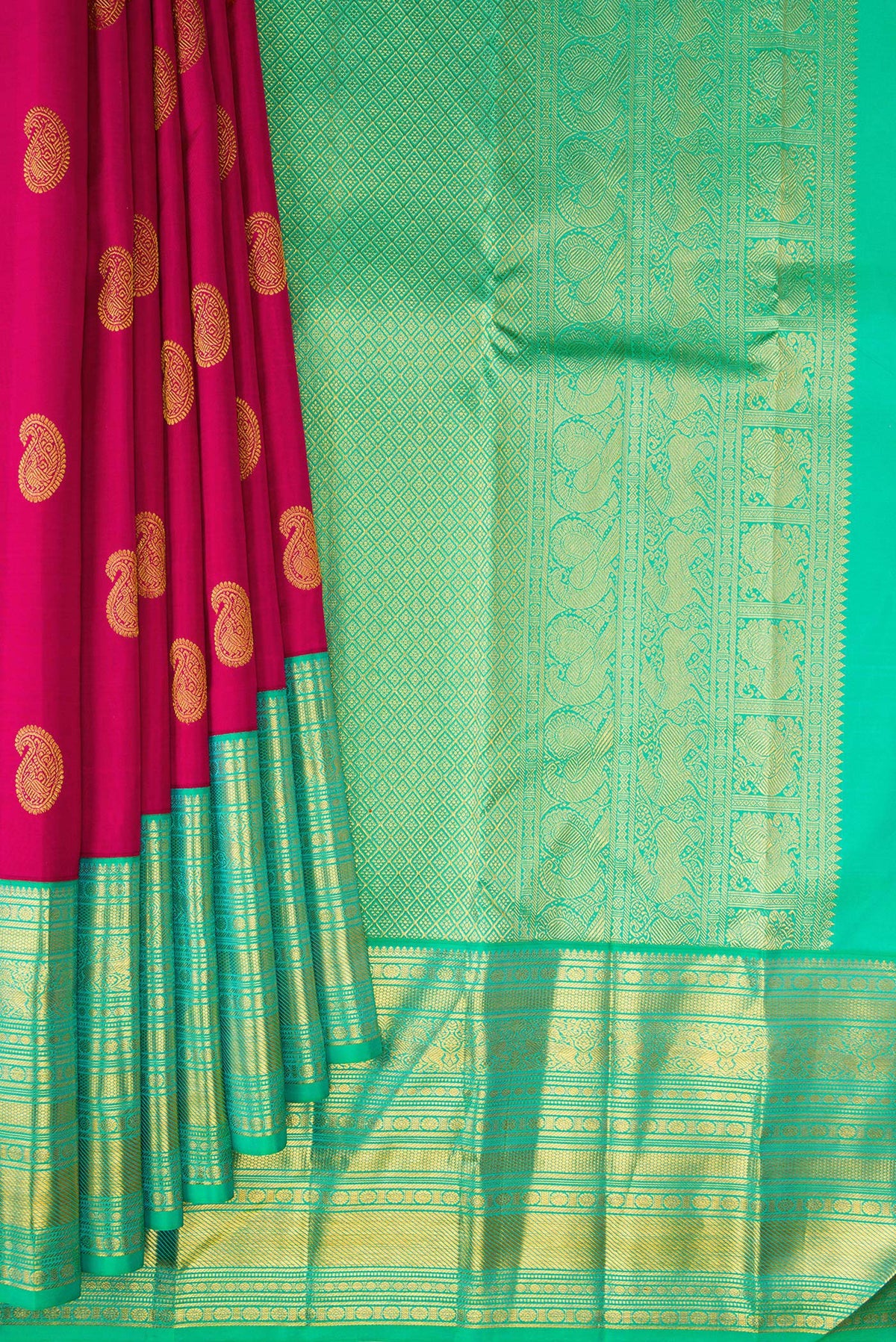 Pleats and pallu of Pure Silk Magenta Kanjivaram Saree with Zari Butta on the body and Zari Border. 