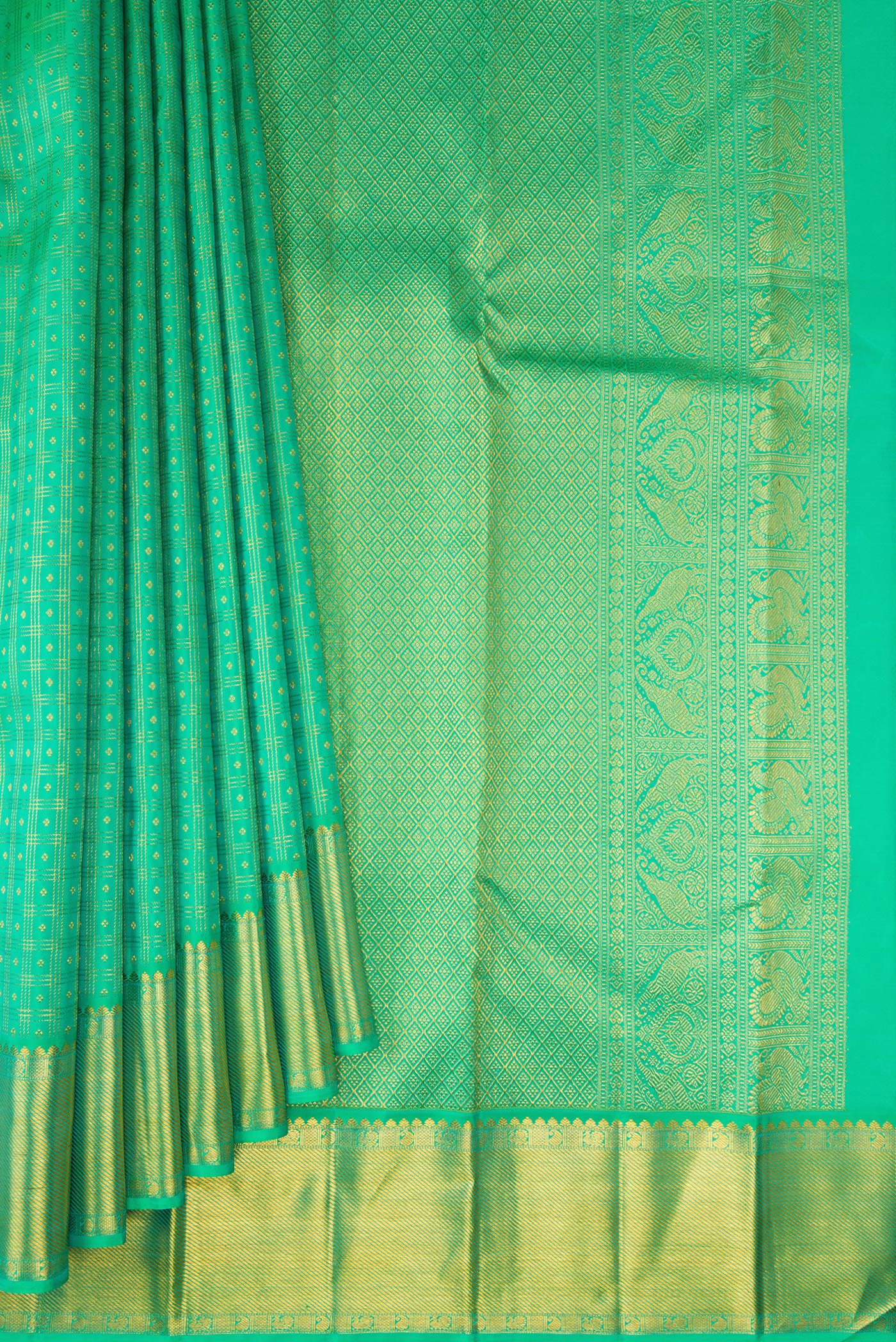 Pleats and pallu of Pure Silk Sea Green Kanjivaram Saree with Checked design on the body and Zari Border. 