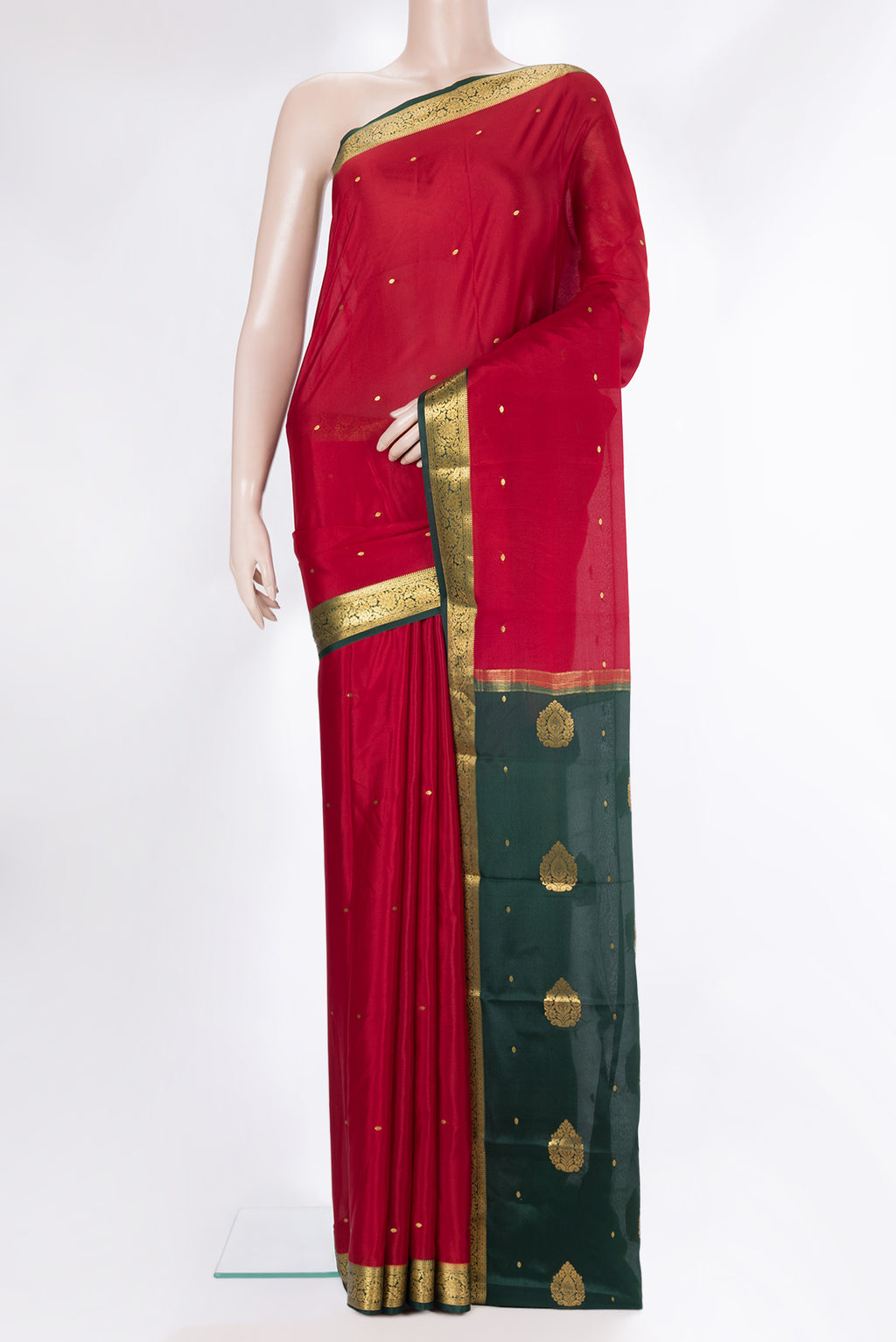 Red Mysore Crepe Saree with Zari Butta on the body and Zari Border.  displayed on a mannequin