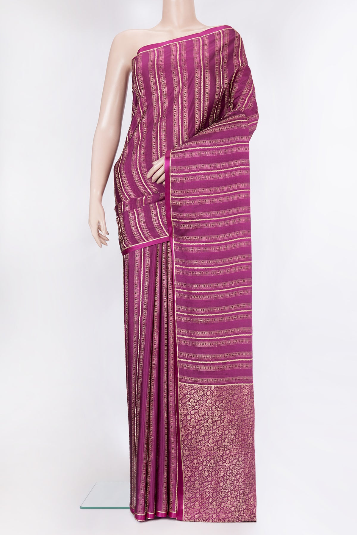 Magenta Dual Tone Banarasi Georgette Saree with Zari Brocade on the body and Plain Border.  displayed on a mannequin