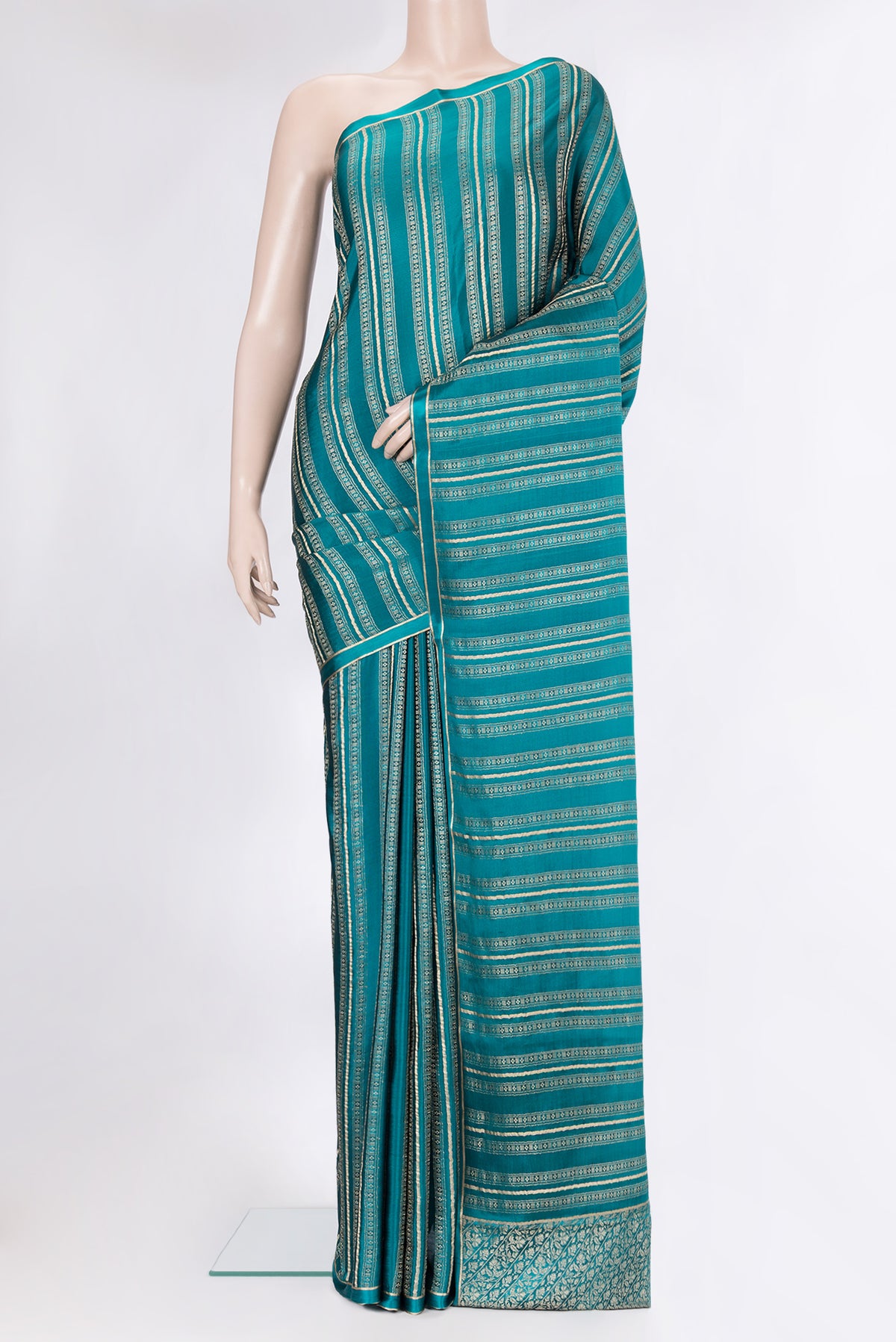 Peacock Blue Dual Tone Banarasi Georgette Saree with Zari Brocade on the body and Plain Border.  displayed on a mannequin