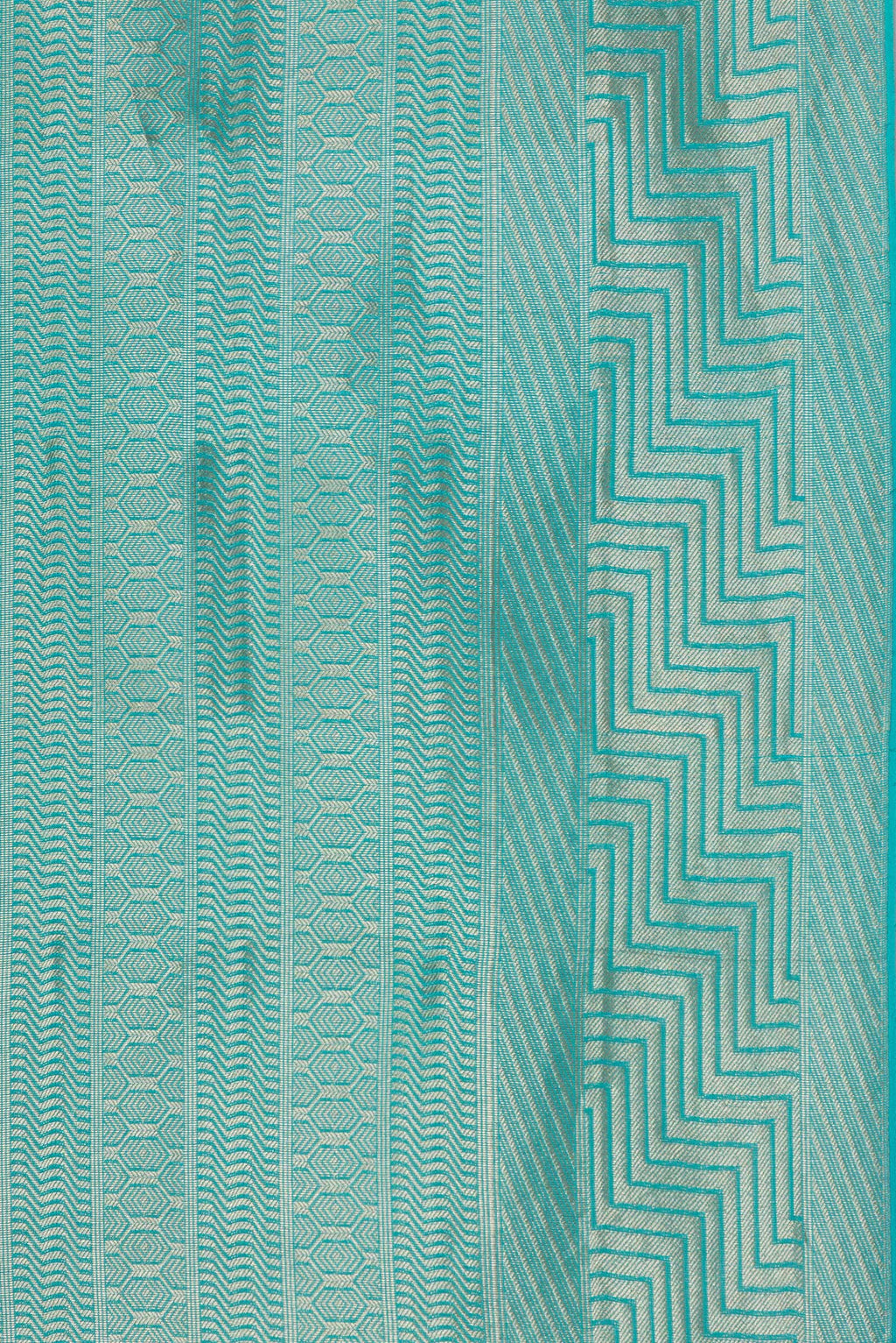 Border image of Sky Blue Dual Tone Banarasi Georgette Saree with Stripes on the body and Zari Border. 