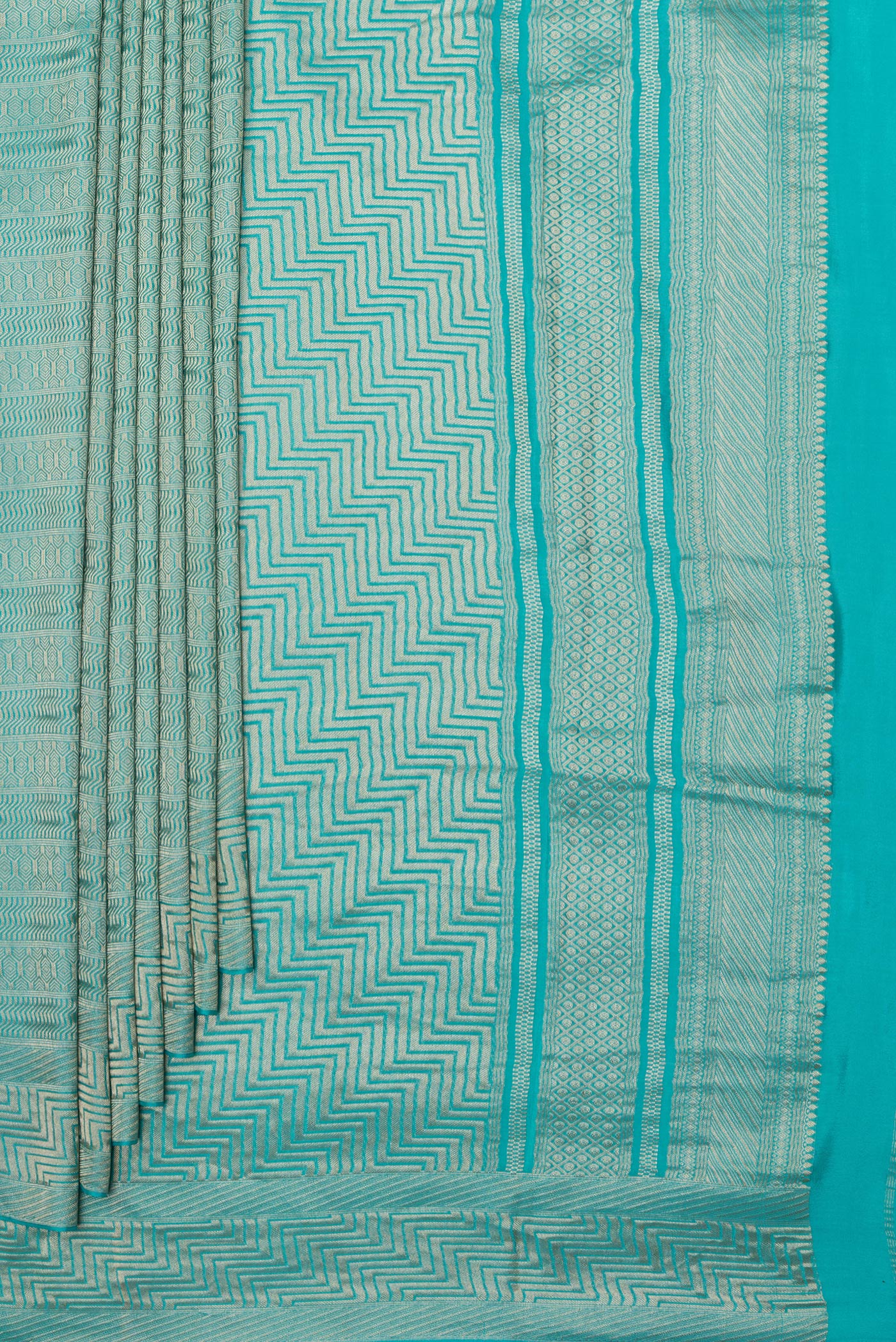 Pleats and pallu of Sky Blue Dual Tone Banarasi Georgette Saree with Stripes on the body and Zari Border. 
