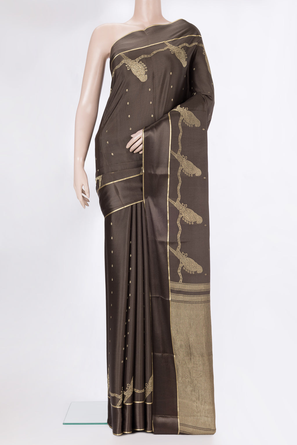 Brown Dual Tone Georgette Saree with Zari Butta on the body and Zari Border.  displayed on a mannequin