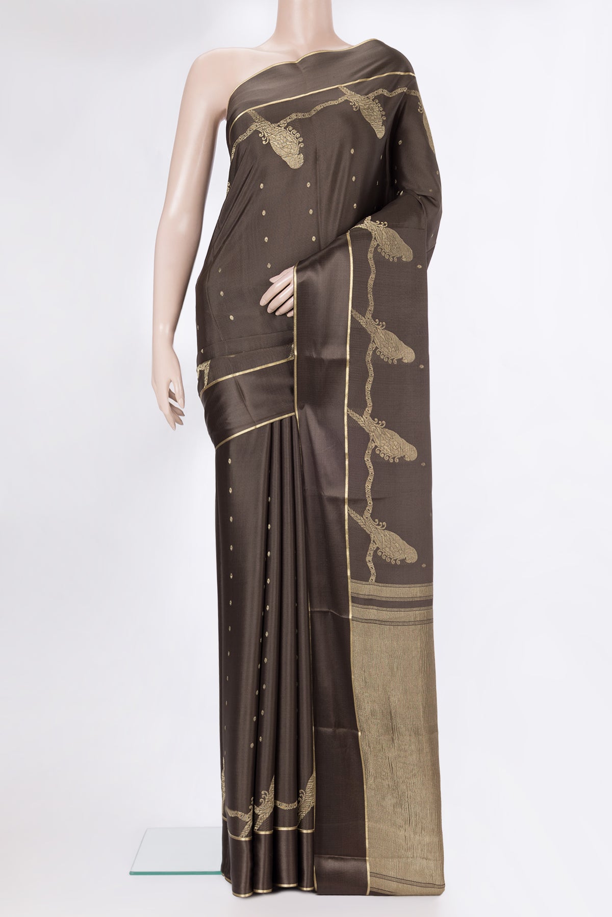 Brown Dual Tone Georgette Saree with Zari Butta on the body and Zari Border.  displayed on a mannequin