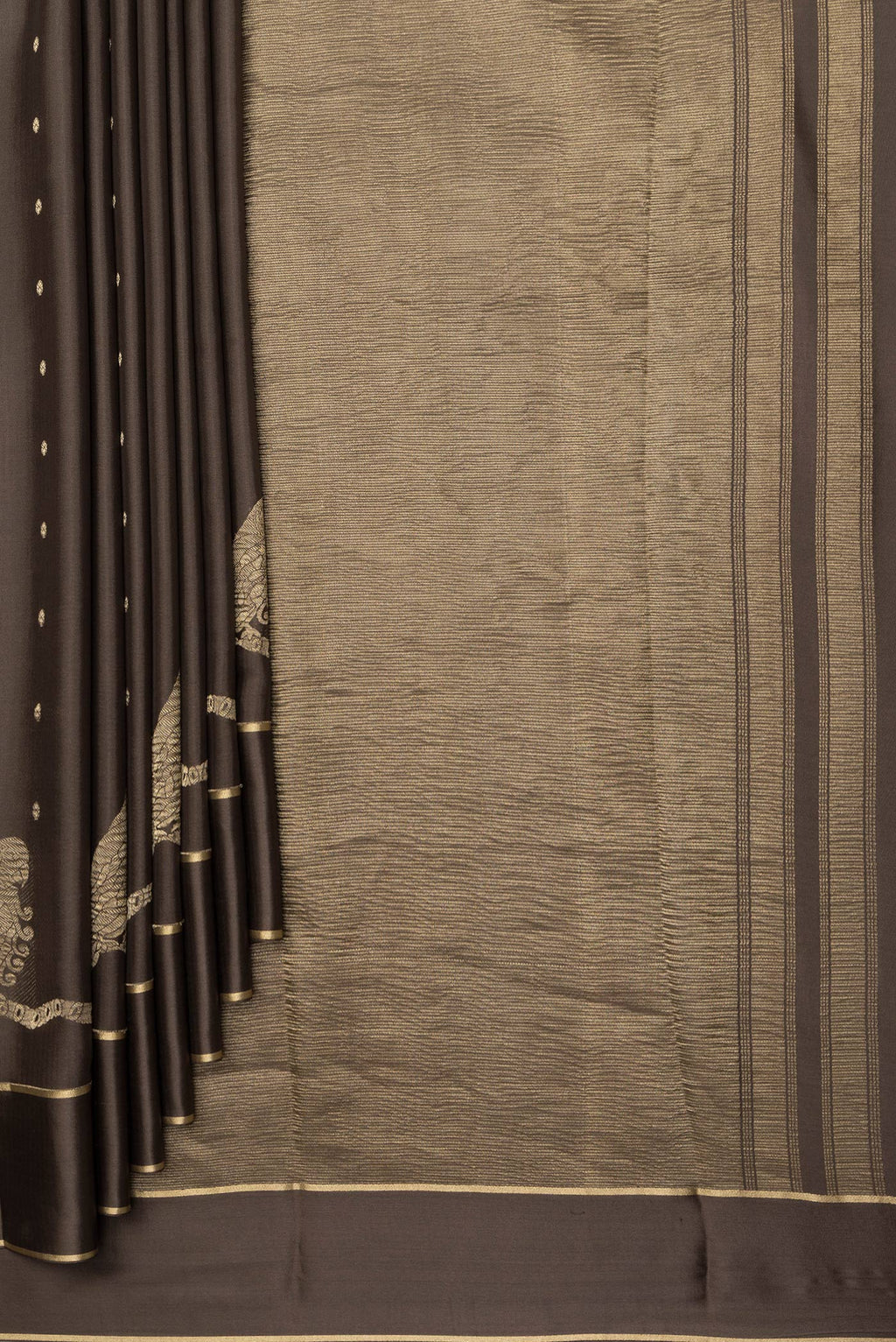 Pleats and pallu of Brown Dual Tone Georgette Saree with Zari Butta on the body and Zari Border. 