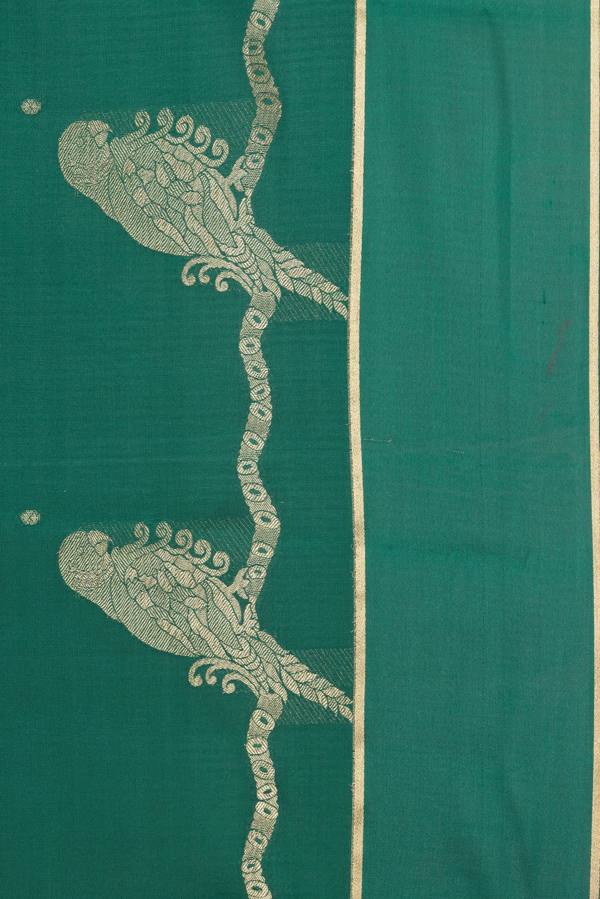 Border image of Pure Silk Green Dual Tone Banarasi Georgette Saree with Zari Butta on the body and Zari Border. 