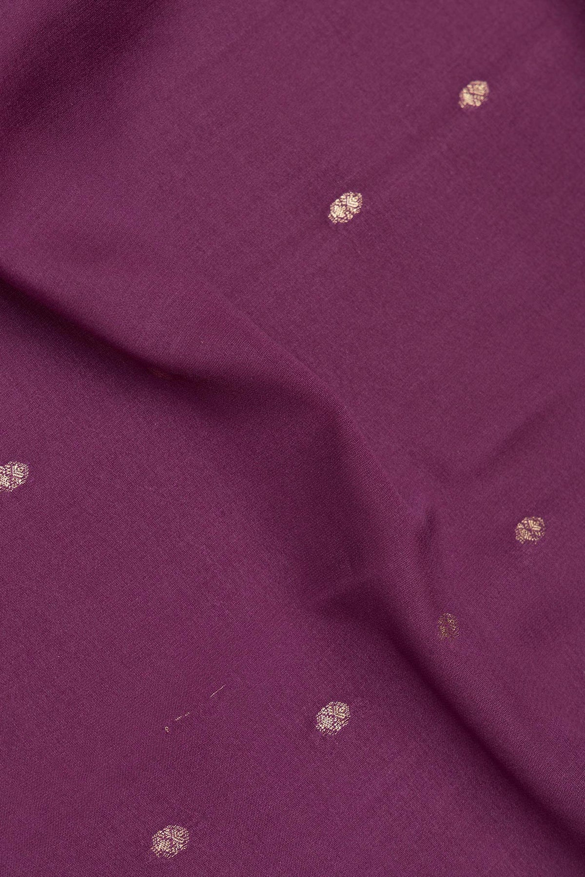 Close up of Purple Mysore Crepe Saree with Zari Butta on the body and Fancy Border.  displaying folds