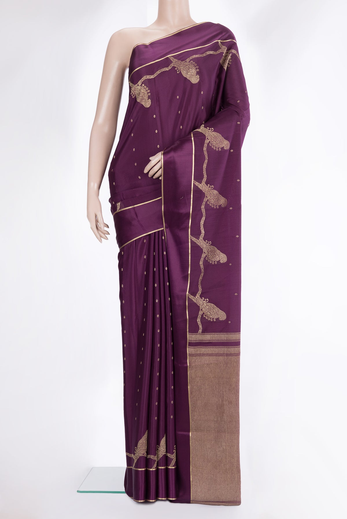 Purple Mysore Crepe Saree with Zari Butta on the body and Fancy Border.  displayed on a mannequin
