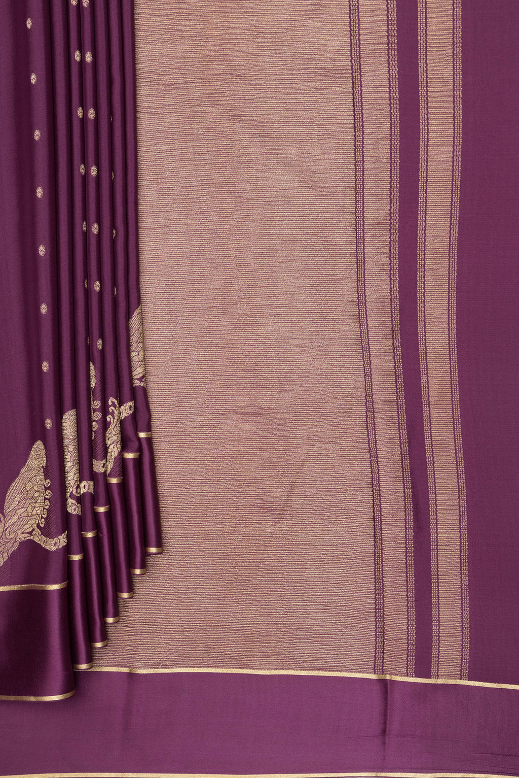 Pleats and pallu of Purple Mysore Crepe Saree with Zari Butta on the body and Fancy Border. 