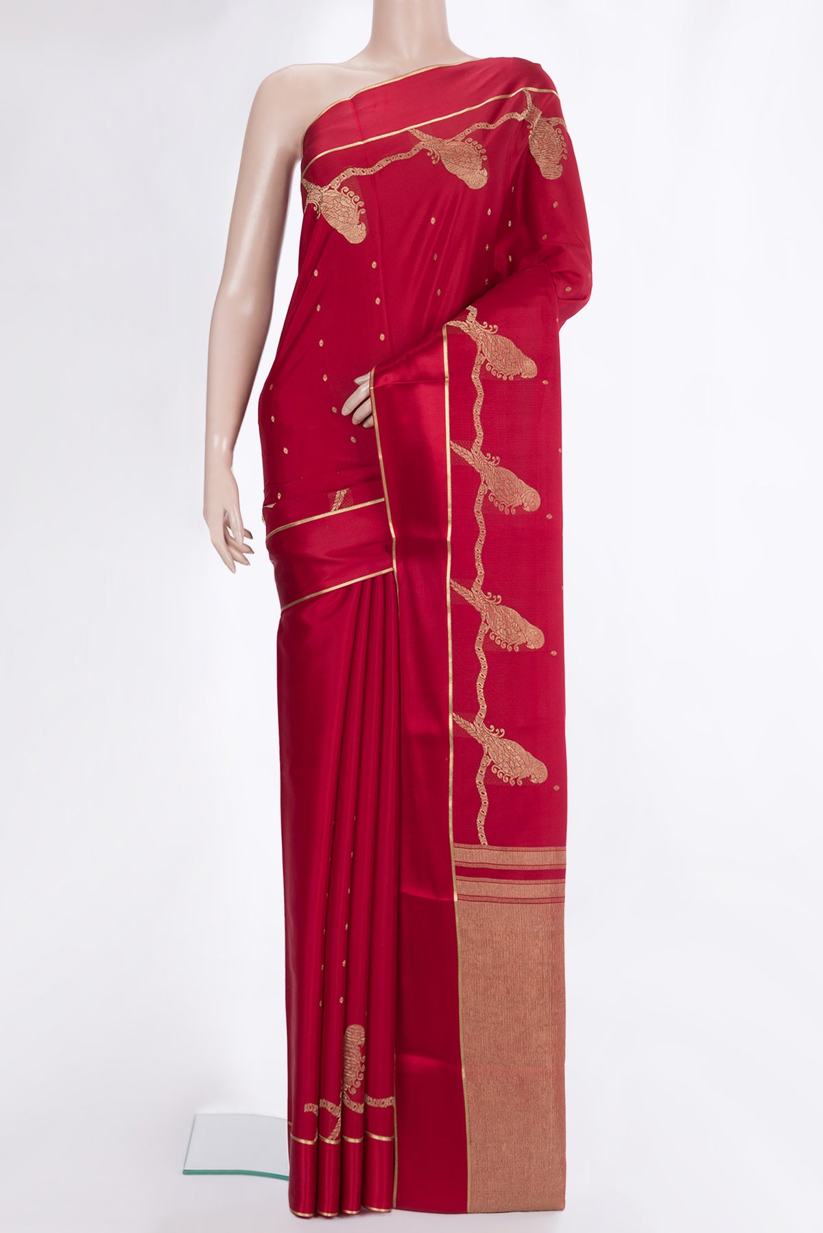 Red Dual Tone Georgette Saree with Zari Butta on the body and Zari Border.  displayed on a mannequin