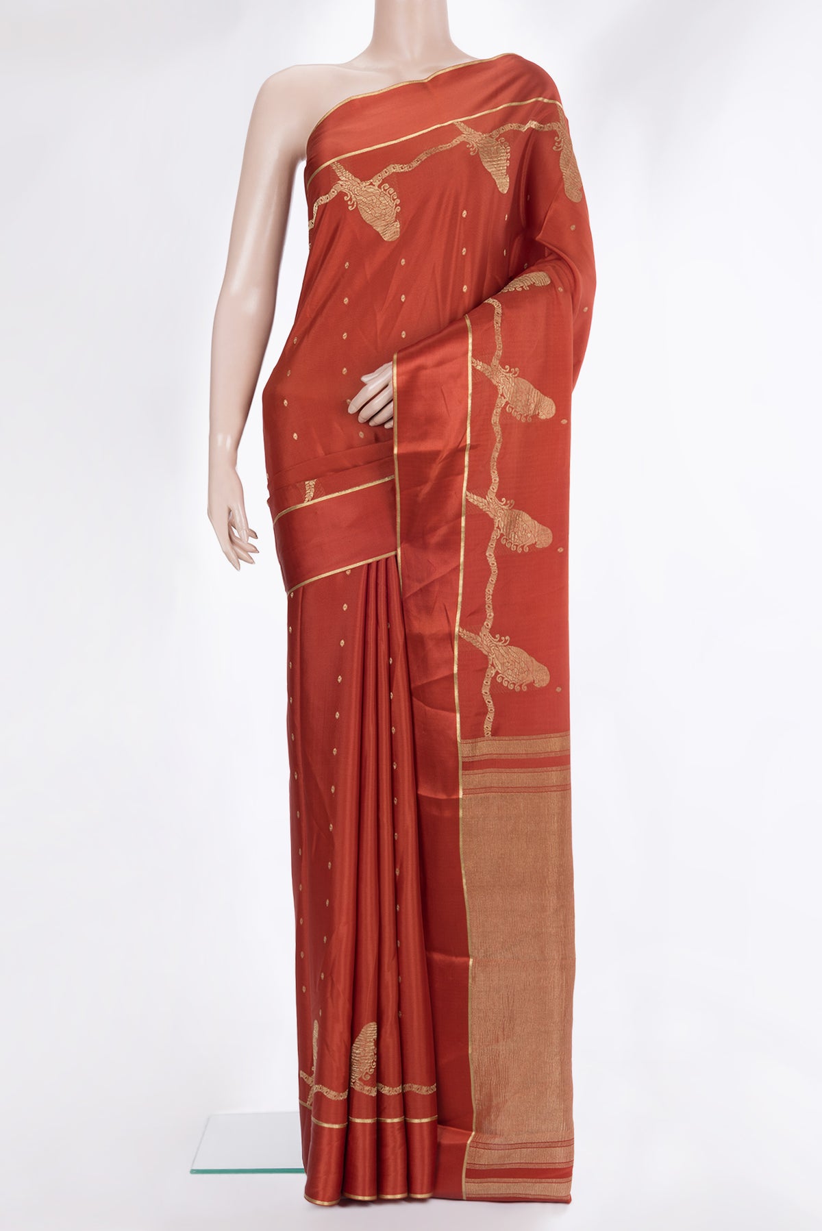 Brick Orange Dual Tone Georgette Saree with Zari Butta on the body and Zari Border.  displayed on a mannequin