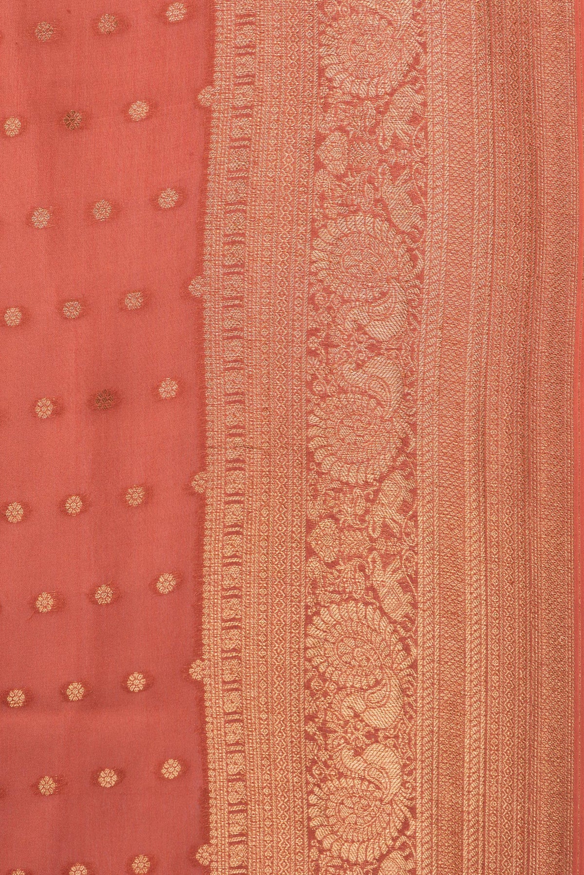 Border image of Rust Dual Tone Georgette Saree with Zari Butta on the body and Zari Border. 