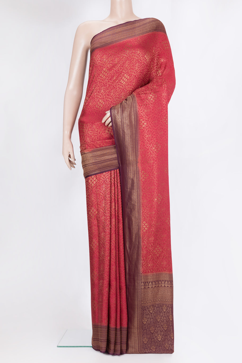 Dark Pink Georgette Saree with Zari Brocade on the body and Zari Border.  displayed on a mannequin