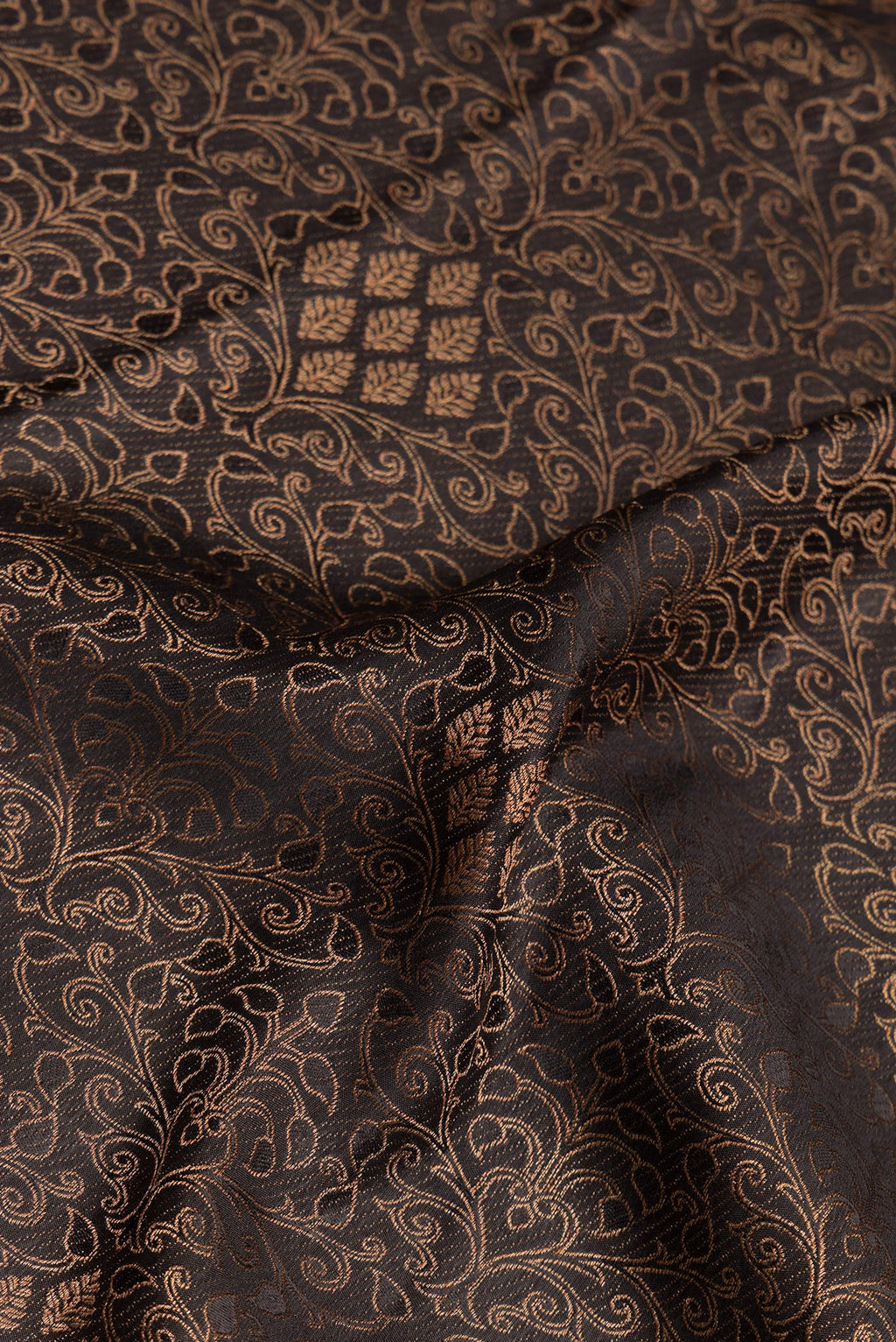 Close up of Pure Silk Black Dual Tone Banarasi Georgette Saree with Zari Brocade on the body and Zari Border.  displaying folds