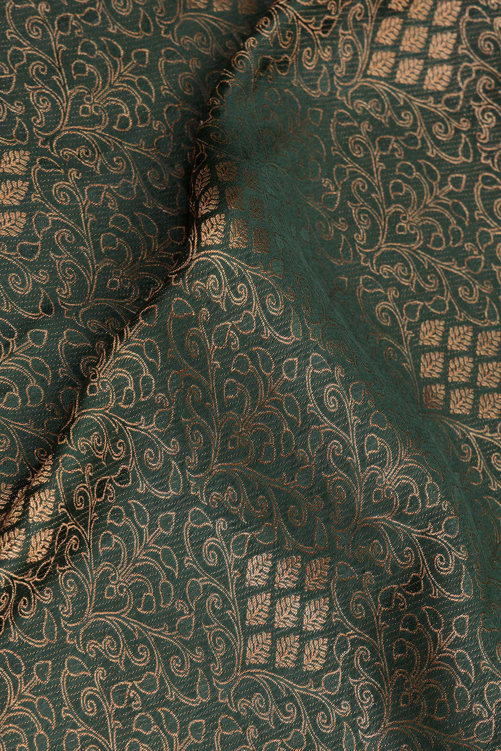 Close up of Pure Silk Bottle Green Dual Tone Banarasi Georgette Saree with Zari Brocade on the body and Zari Border.  displaying folds