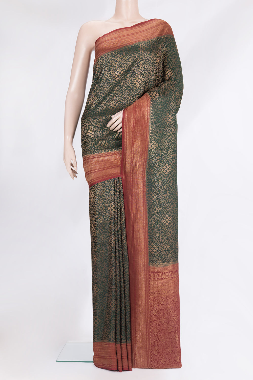Pure Silk Bottle Green Dual Tone Banarasi Georgette Saree with Zari Brocade on the body and Zari Border.  displayed on a mannequin