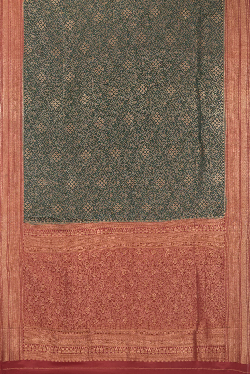 Flat view of Pure Silk Bottle Green Dual Tone Banarasi Georgette Saree with Zari Brocade on the body and Zari Border. 