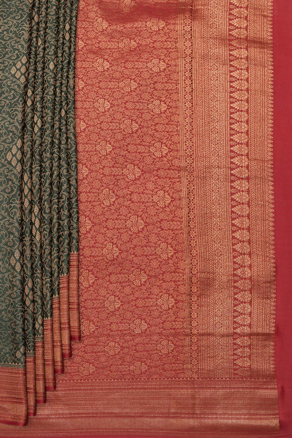 Pleats and pallu of Pure Silk Bottle Green Dual Tone Banarasi Georgette Saree with Zari Brocade on the body and Zari Border. 