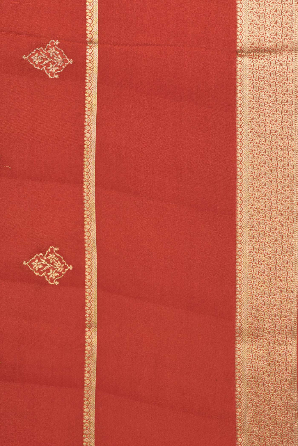 Border image of Pure Silk Rust Dual Tone Banarasi Georgette Saree with Zari Butta on the body and Zari Border. 