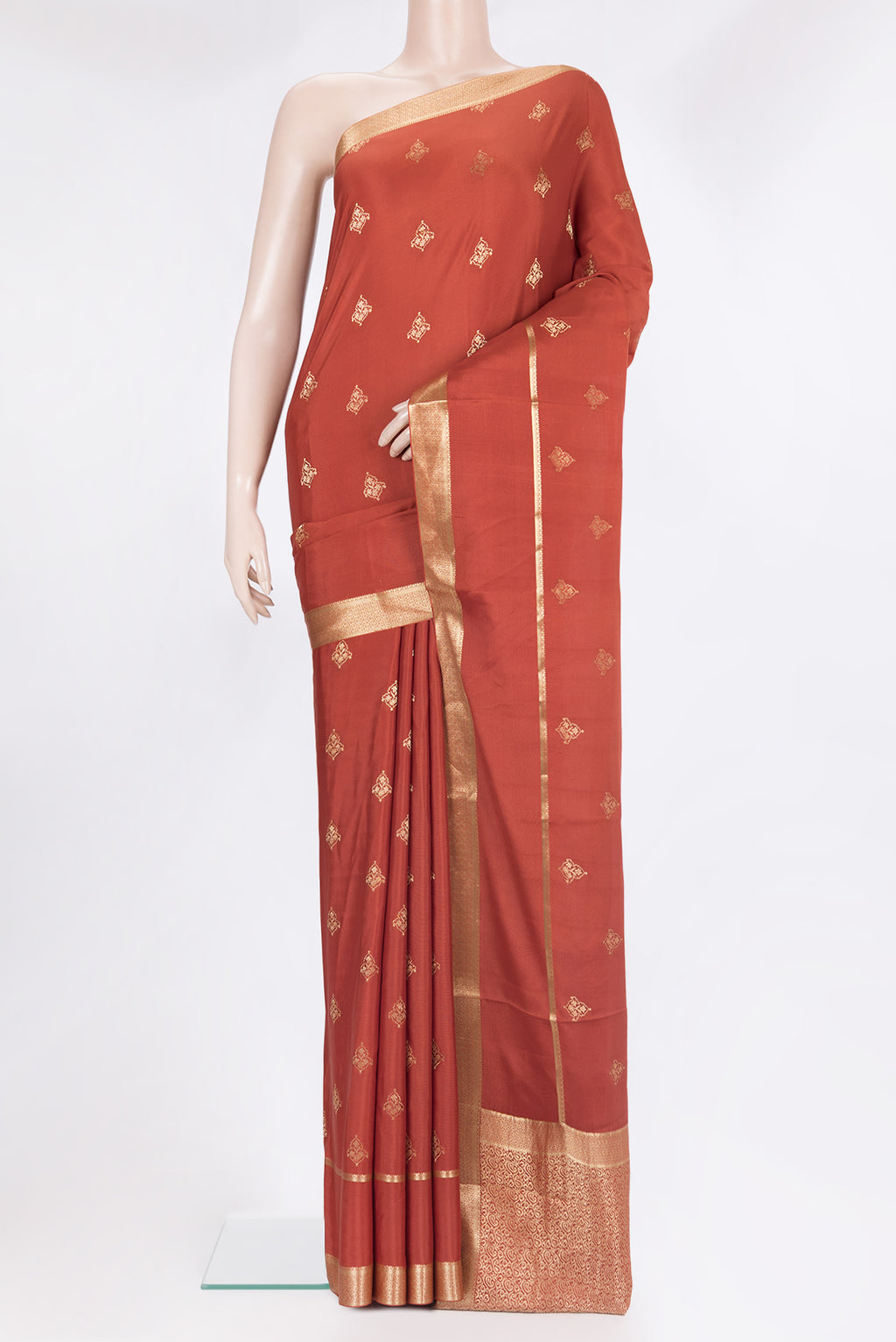 Pure Silk Rust Dual Tone Banarasi Georgette Saree with Zari Butta on the body and Zari Border.  displayed on a mannequin