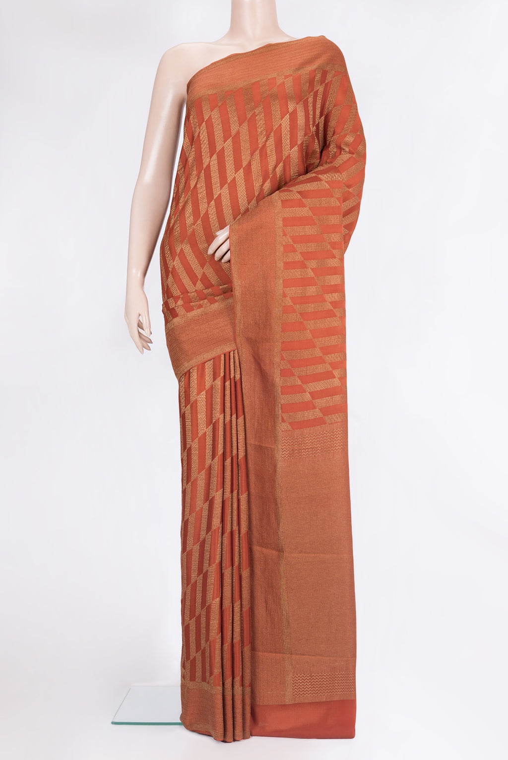 Pure Silk Rust Dual Tone Banarasi Georgette Saree with Zari Brocade on the body and Zari Border.  displayed on a mannequin