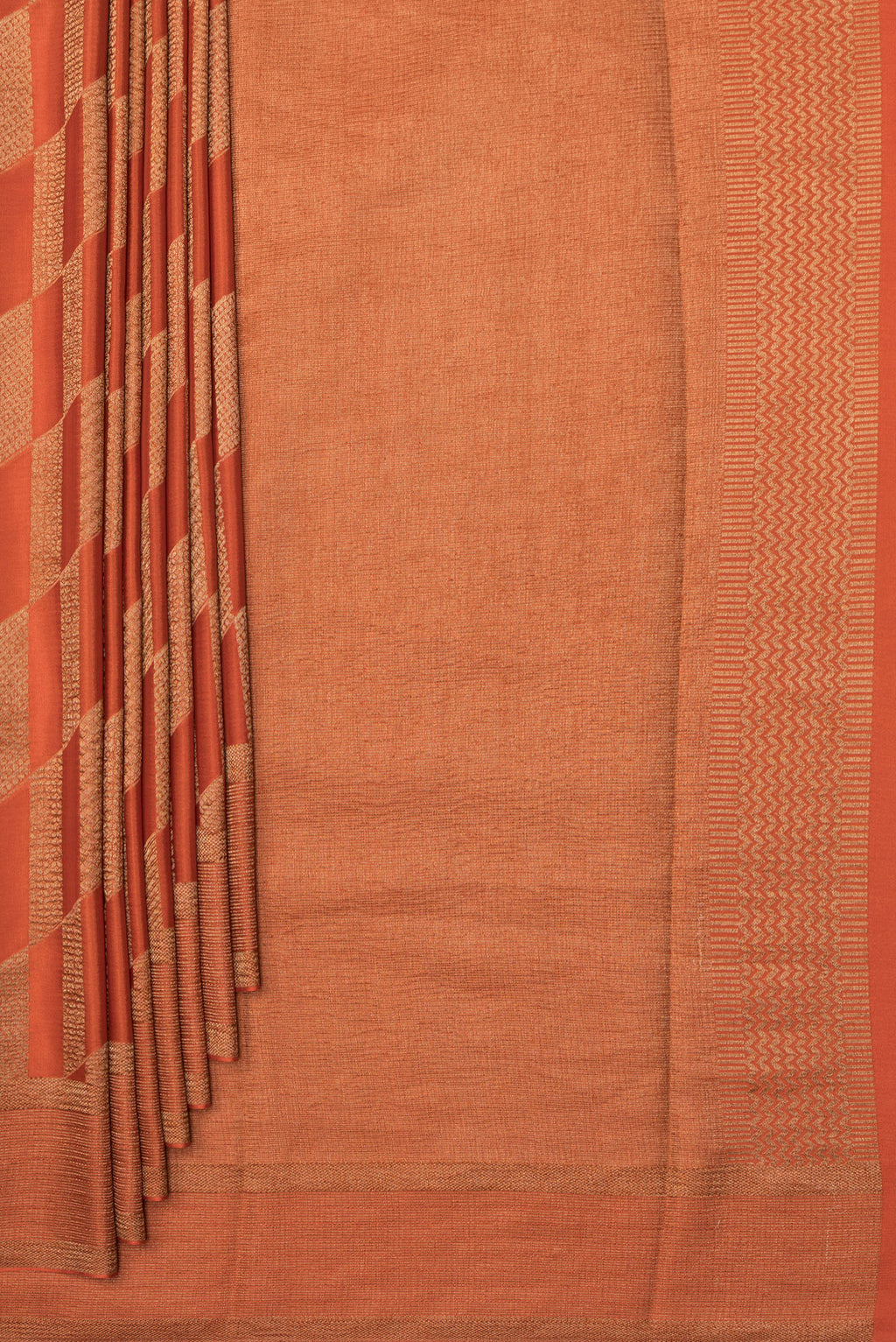 Pleats and pallu of Pure Silk Rust Dual Tone Banarasi Georgette Saree with Zari Brocade on the body and Zari Border. 