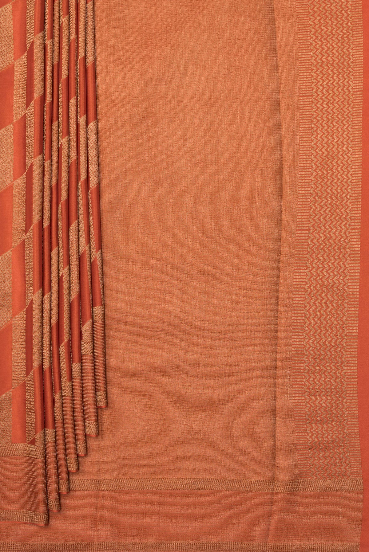 Pleats and pallu of Pure Silk Rust Dual Tone Banarasi Georgette Saree with Zari Brocade on the body and Zari Border. 