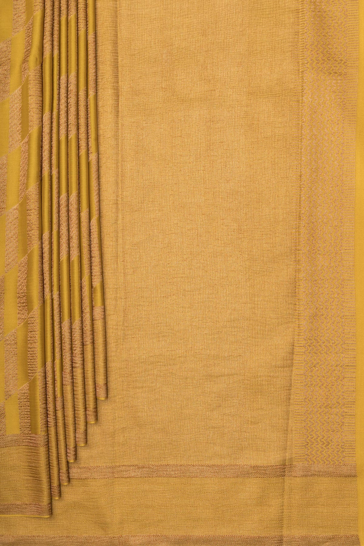 Pleats and pallu of Mustard Dual Tone Banarasi Georgette Saree with Zari Brocade on the body and Zari Border. 