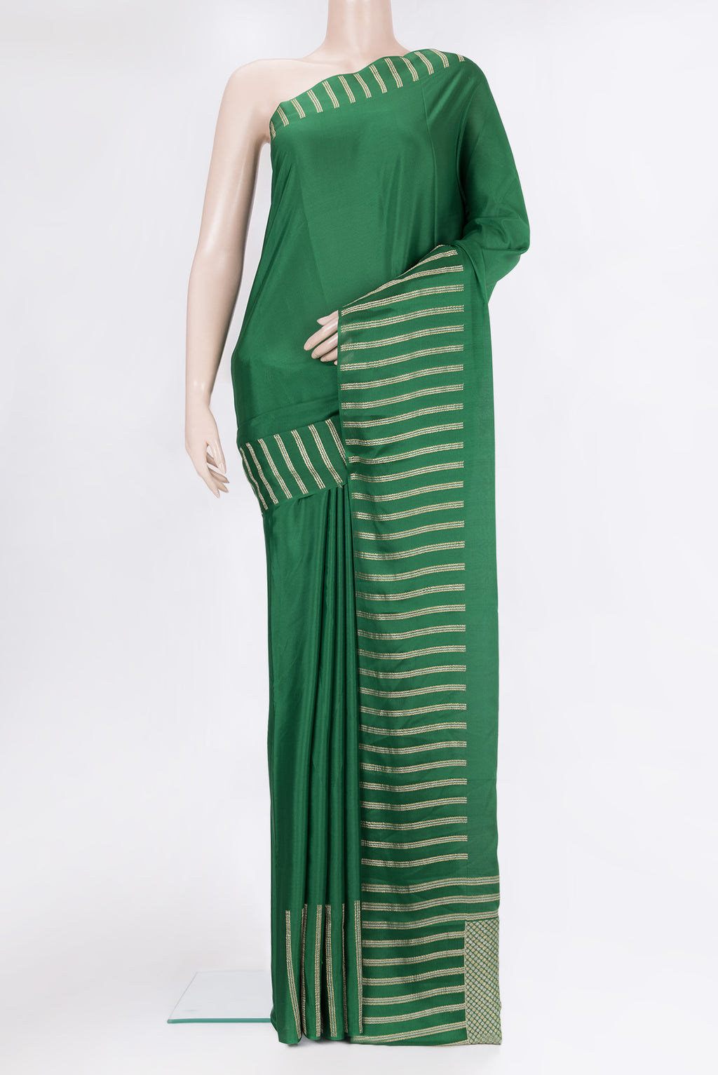 Green Georgette Saree with Plain Body and Fancy Border.  displayed on a mannequin