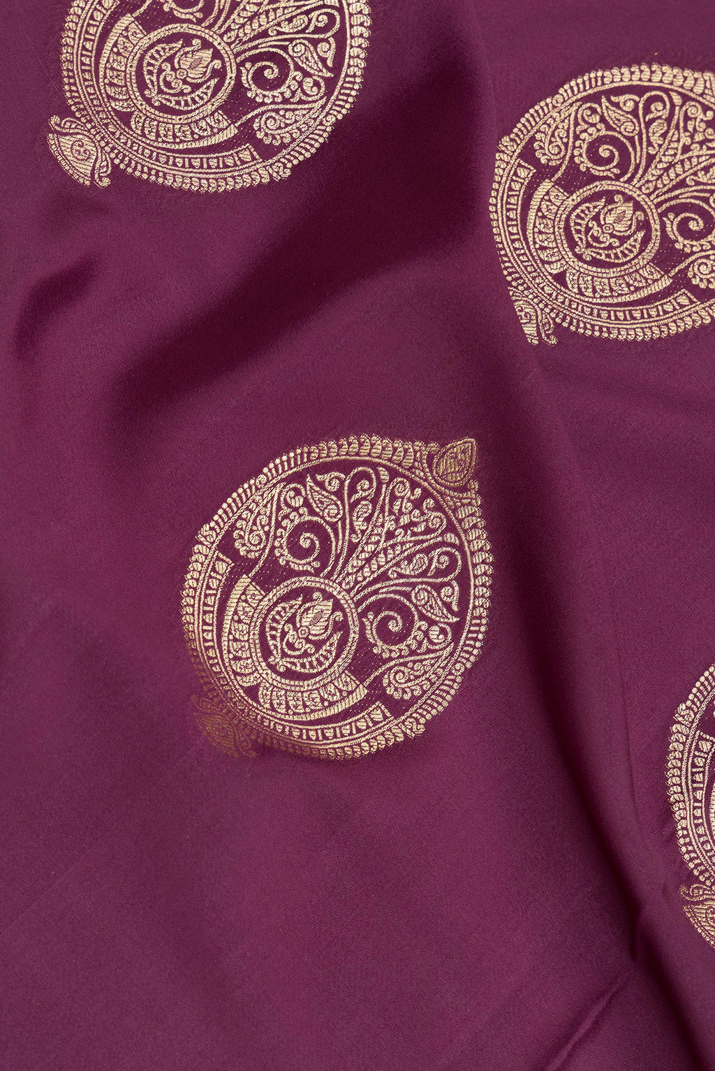 Close up of Pure Silk Purple Dual Tone Banarasi Georgette Saree with Zari Butta on the body and Zari Border.  displaying folds